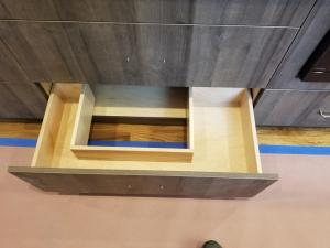 Special U-Drawers to fit around downdraft system